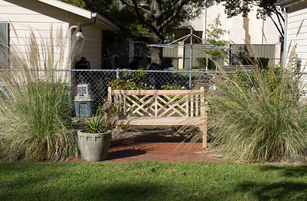 I chose to photograph the terrace from the front to show all of the new elements. Unfortunately doing so also captured my neighbor’s “collection”. Eventually the antique rose bushes along the fence will grow larger and help screen out that view.