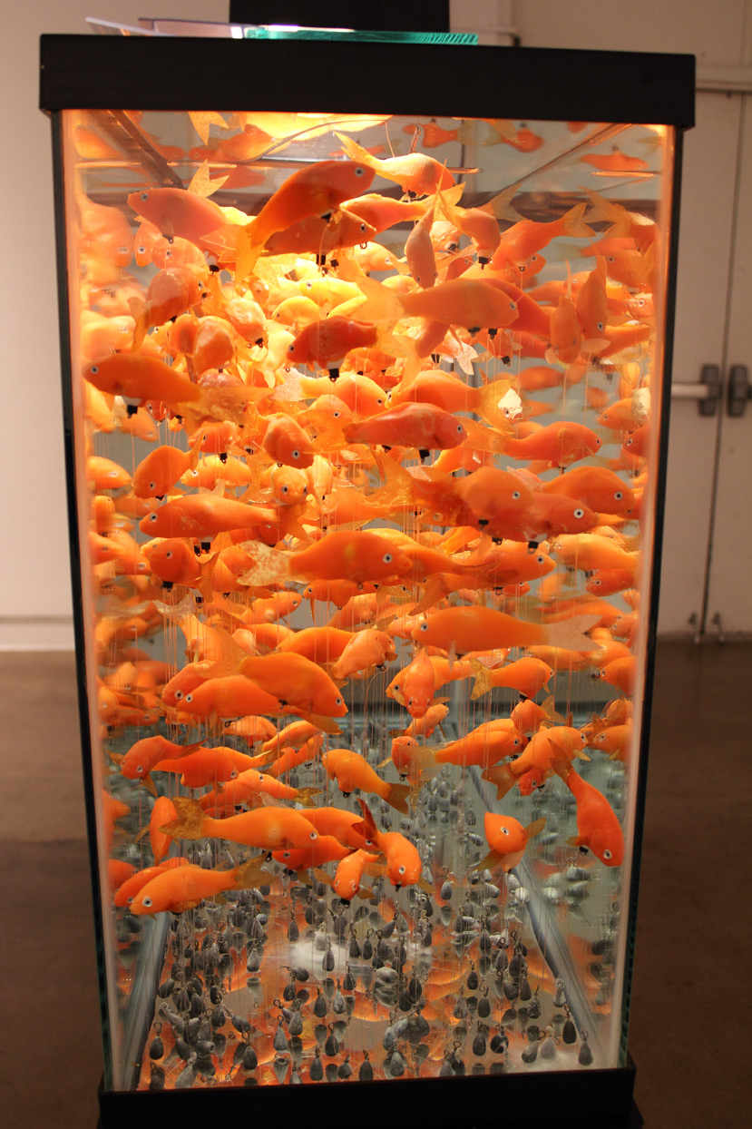 (above) Helen Altman, 'Goldfish,' 2009. Cast plastic, epoxy, lead weights, monofilament line, 45 gallon aquarium and stand, and miscellaneous elements. Side view detail. 57 x 37 x 13 inches