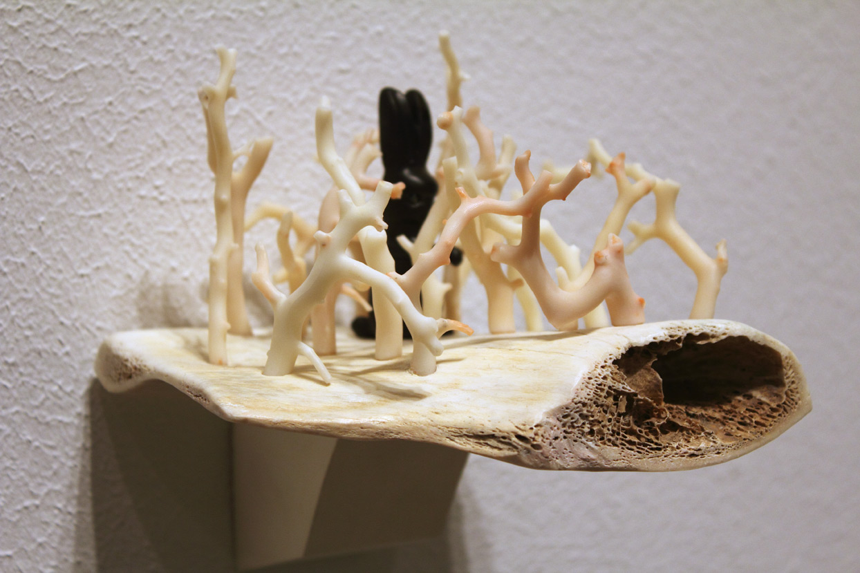 (above) Celia Eberle, 'Petrified Forest' (one of three pieces), 2008. Bone, coral, and jet, 5 x 5 x 4.25 inches