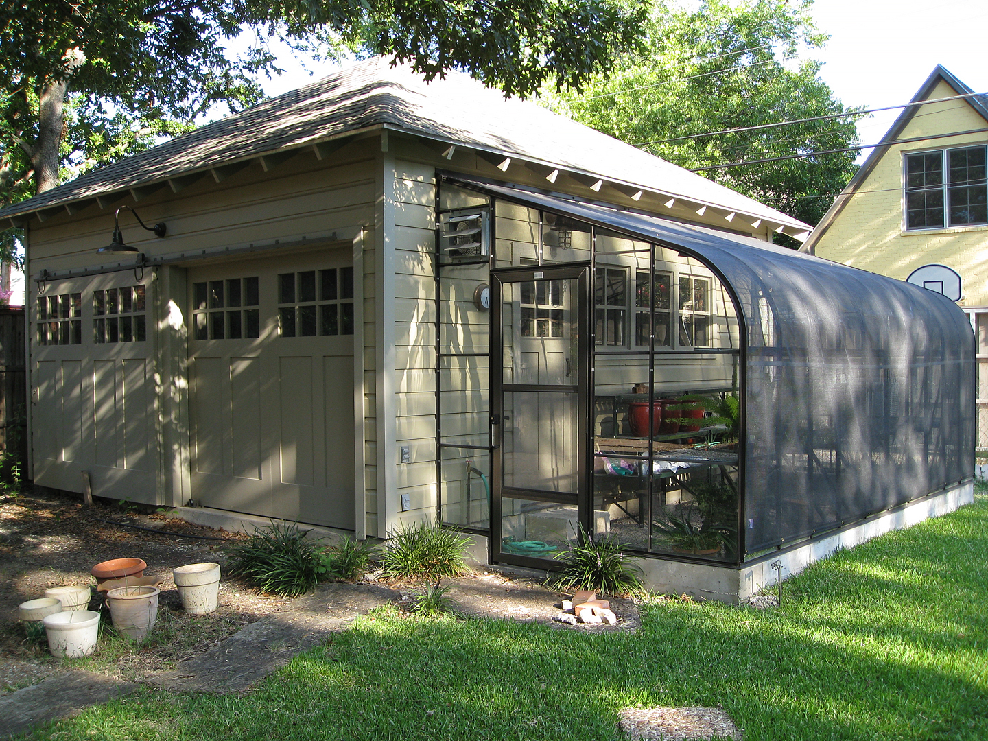(above) Charley McKenney, my architect, chose three greens. A dark gray green for the doors, a lighter gray green for the trim, and a yellow green for the walls. It's all very subtle and changes depending on the time of day.