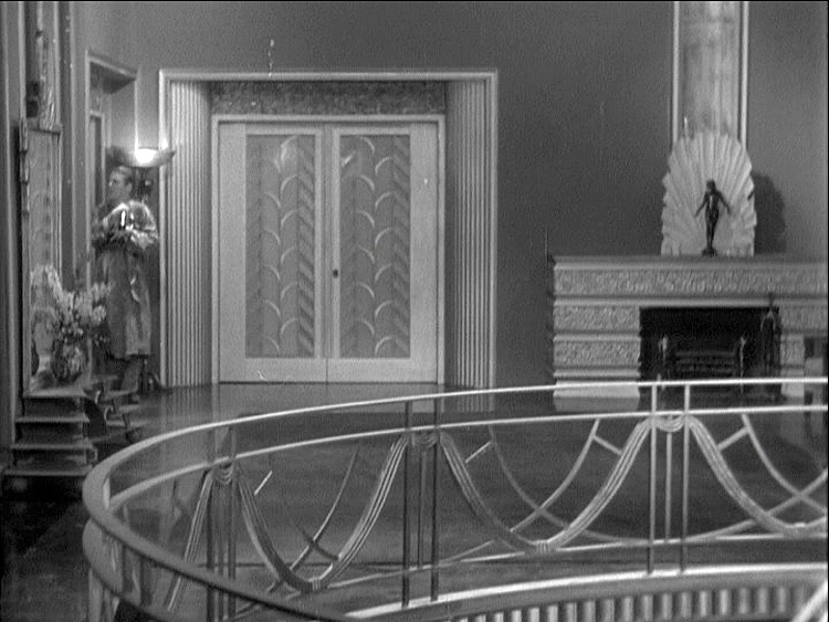 (above) His home. The second floor landing is a room unto itself.