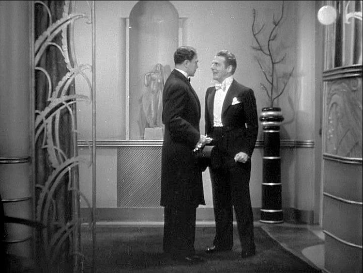 (above) At his home in the foyer.