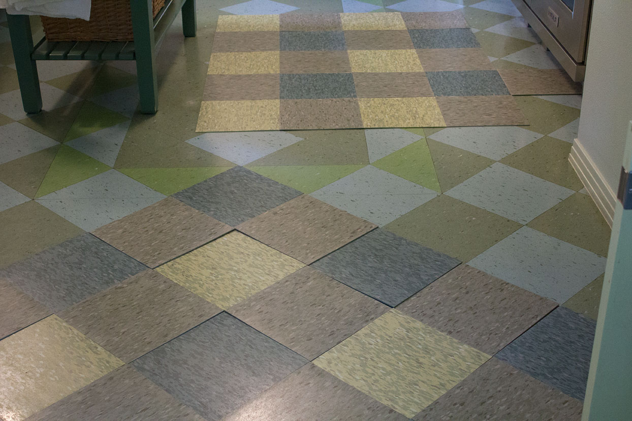 This plaid/checkered pattern was the chosen option. The diagonal version, seen in the foreground, is the chosen direction the tiles are to be laid. The tile is Tarkett Azrock VCT.