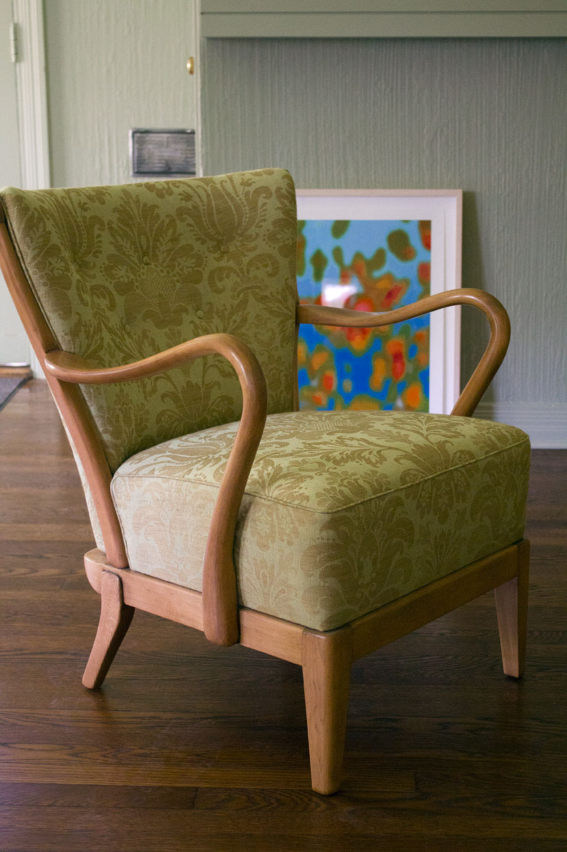 (above) Behind the chair is a piece by Scott Barber called 'Swell.' Giclée print on Lysonic paper. First edition, October, 2004, limited to 500. Once it's hung, I'll do a full-on proper photograph of it, but I'm waiting for the final coat of paint to be applied on the above wall cabinet before I hang it.