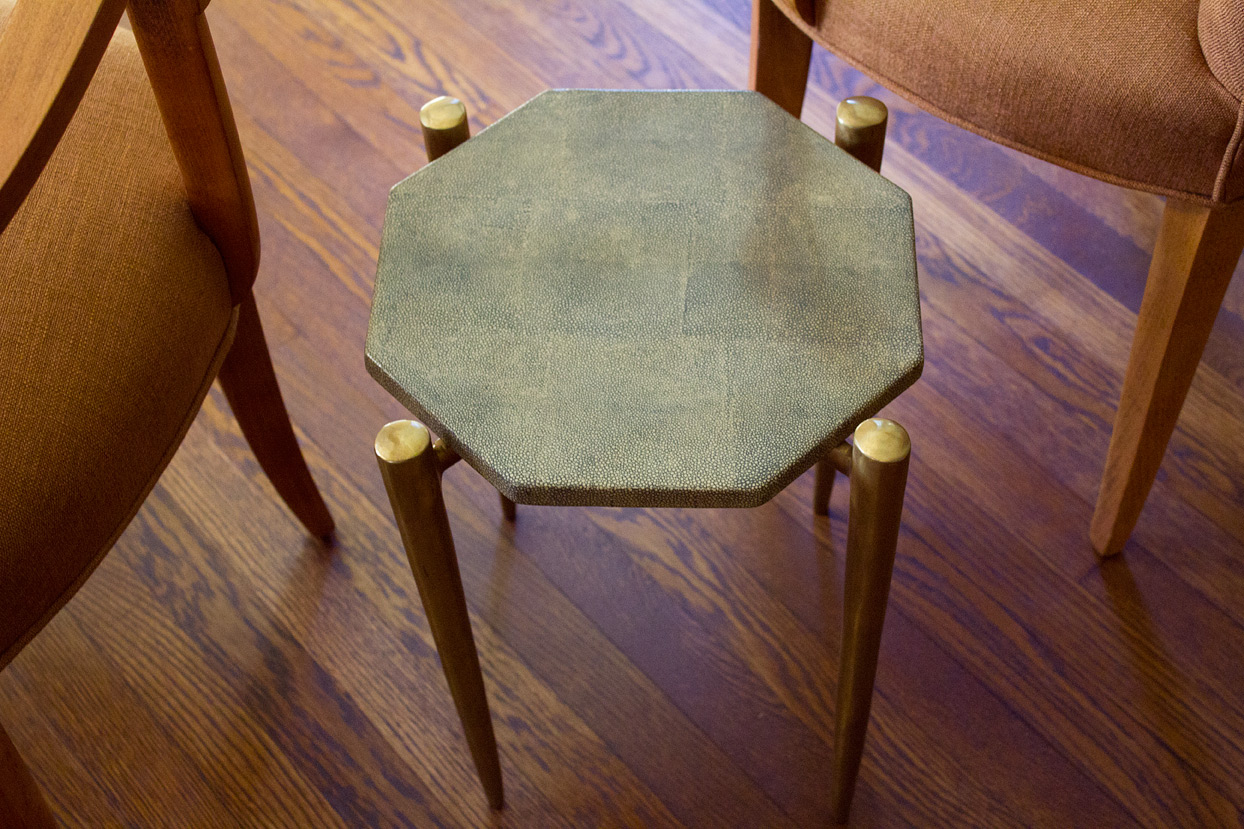 (above) A tiny side table that’s just big enough for a couple of cocktails.
