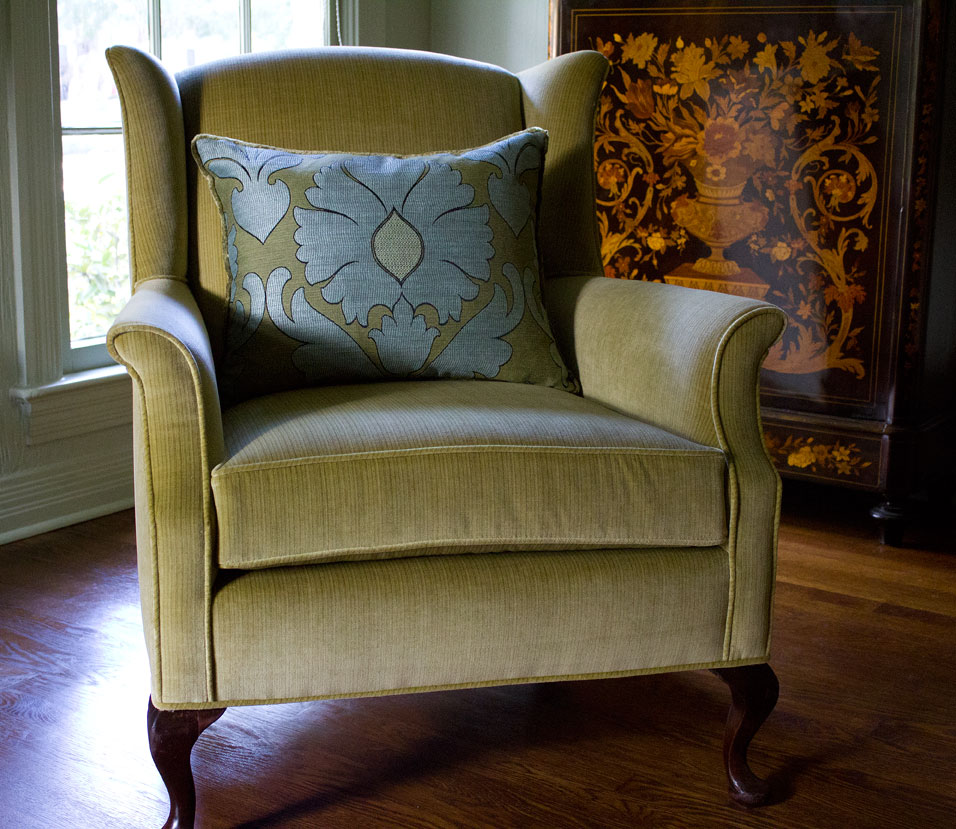 Click on the photo for a larger version, and then you will be able to see the tiny stripe detail of the chair’s upholstery.