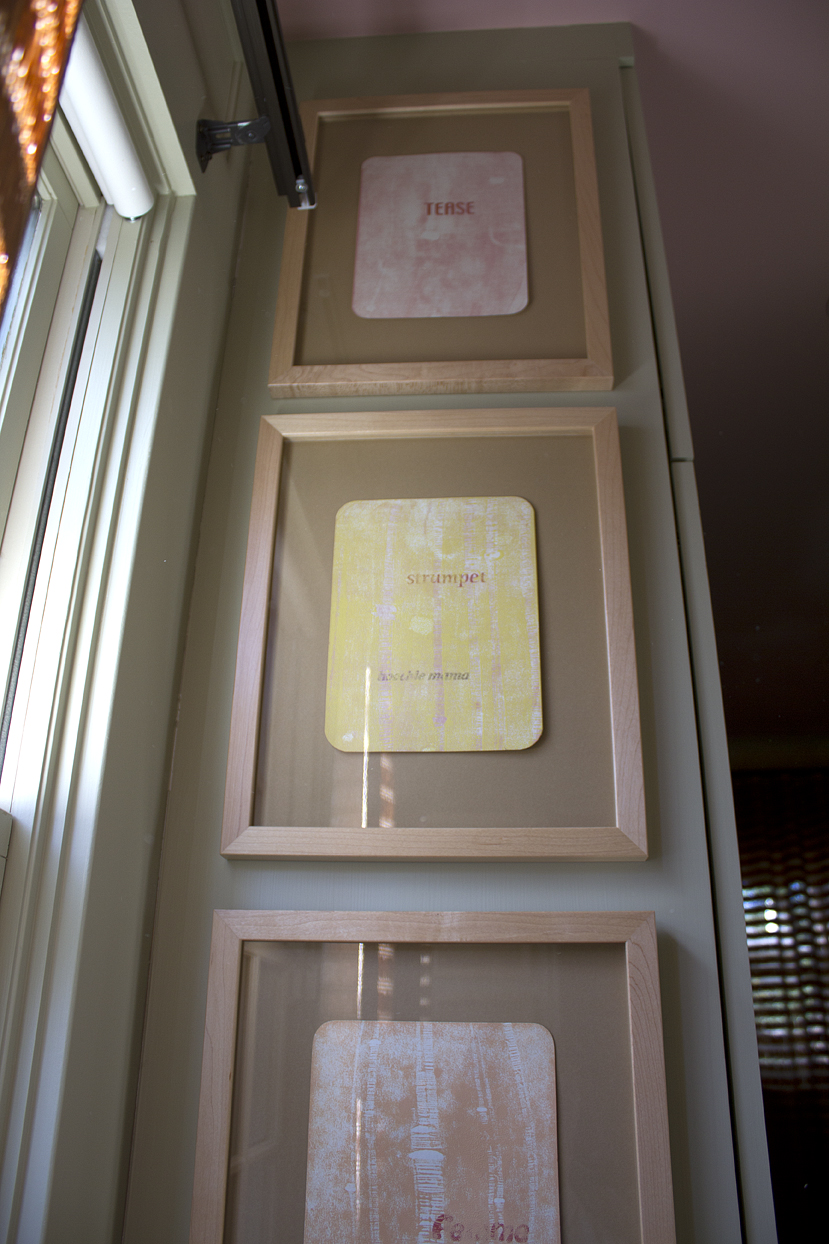 (above) The printed words from top to bottom are tease, strumpet, hoochie mama, femme fatale. The second display of four prints uses some of the same words with the addition of hussy, minx, loose, coquette, whore, and harlot.