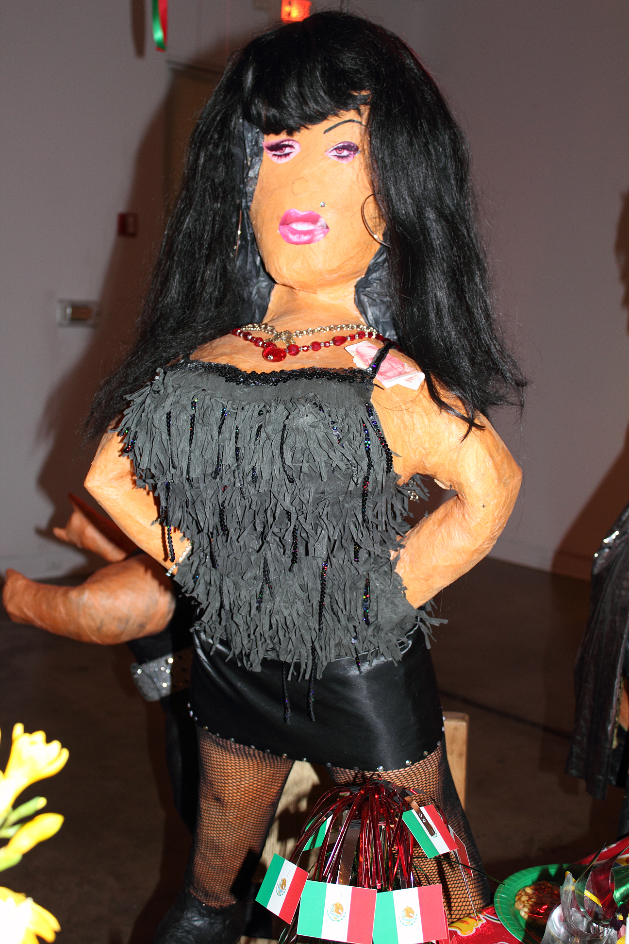(above two) These photos are details from the second and largest gallery. Cow Goddess (CG) considerably altered these piñatas to their present eccentric forms, a time consuming and laborious endeavor. The others involved with this show were Claude Albritton III, Liliana Bloch, San Angel Gallery, Hank Lee, Judy Niven, Bruce Richardson, and Christie Vela. Visit The MAC's website for the show's dates and The MAC's hours of operation.